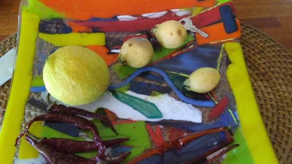 Tiny, dry, almost-tasty mangos from our tree in Uruguay