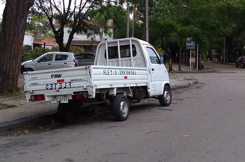 Backwards lettering on the back of a truck