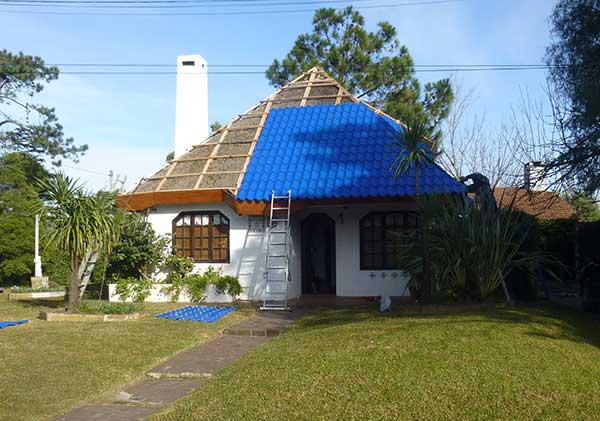 Quincho (thatched) roof being "modernized" - Atlántida, Uruguay