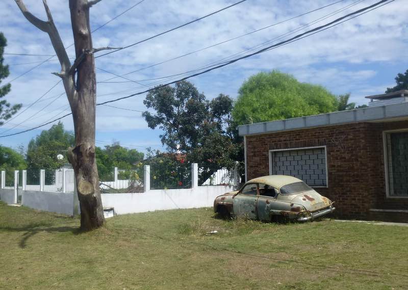 Old Saab in yard, Salinas, Canelones, Uruguay