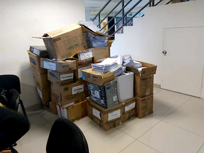 un-filed papers in boxes