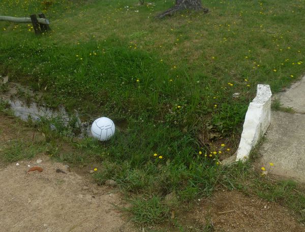 fake soccer ball in ditch