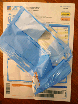Uruguay utility bill in plastic envelope